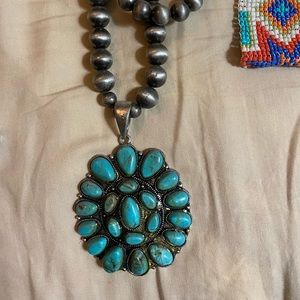 Faux turquoise squash blossom